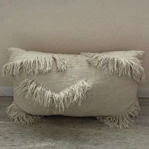 Cream throw pillow
